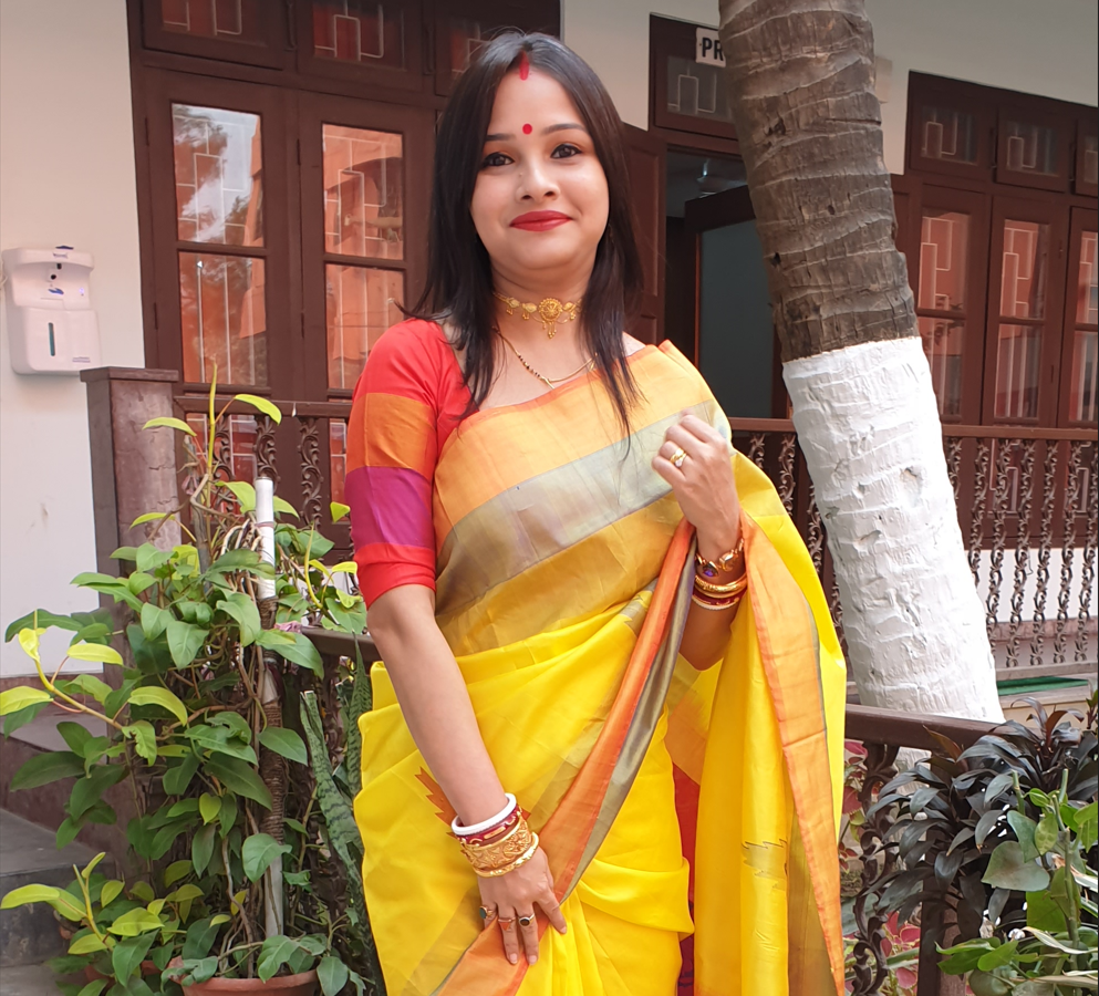 wering yellow cotton saree for office