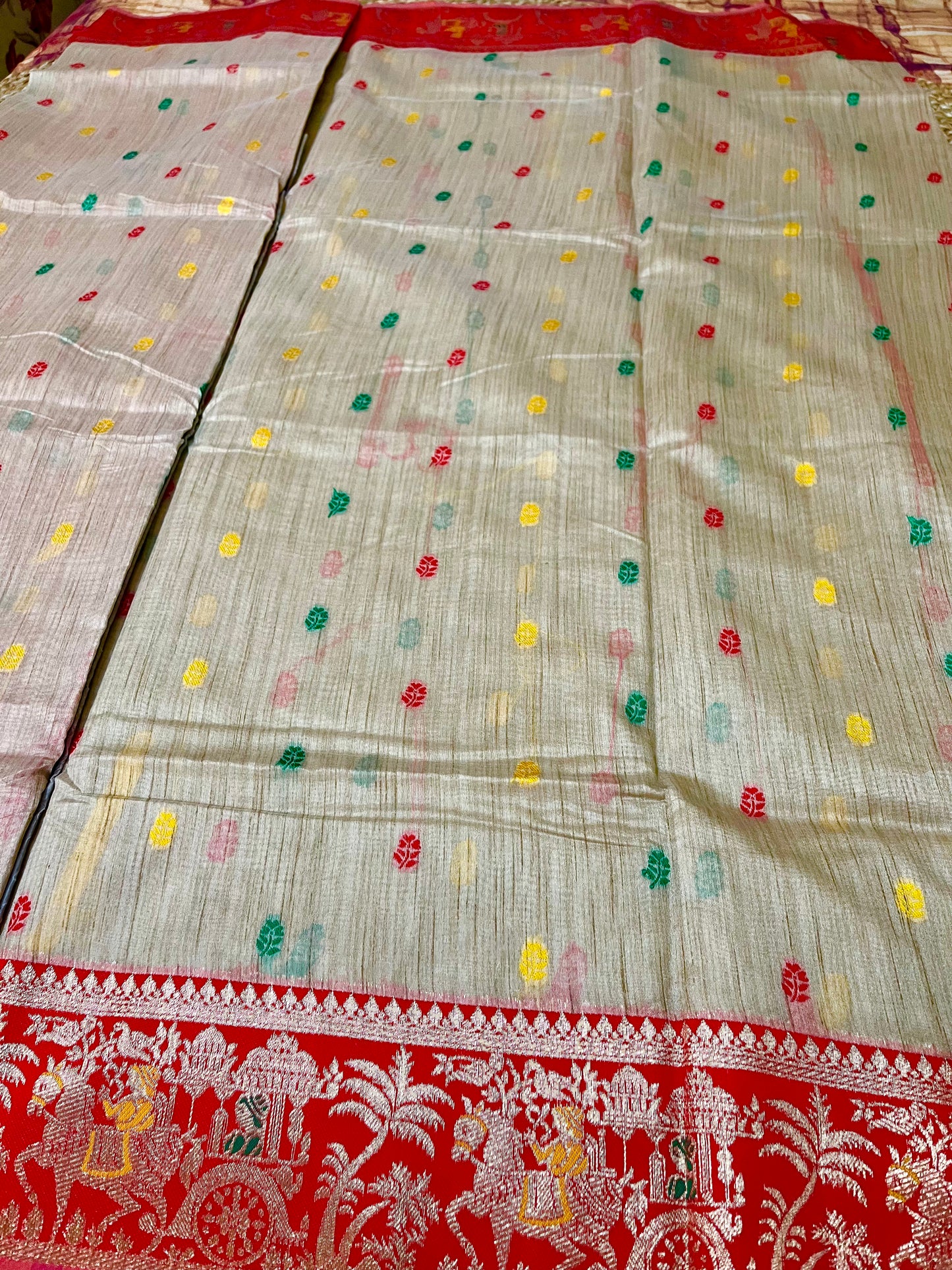 Tissue Saree with Buti work all over the body